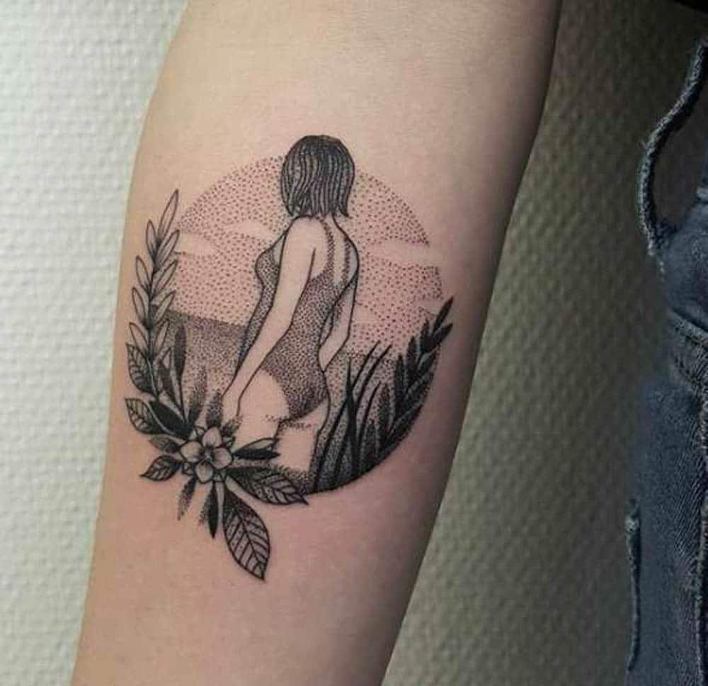 women's outer forearm tattoo