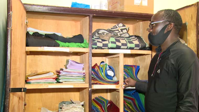 COVID-19: Disabled school director moves into his office, hawks sweets to make ends meet