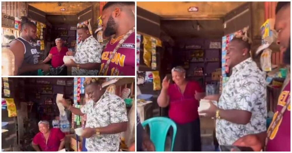 Anyidons, Nigerian singer, throws money at the woman.