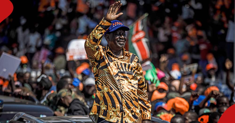 Azimio La Umoja leader Raila Odinga waves to a crowd at a political rally.