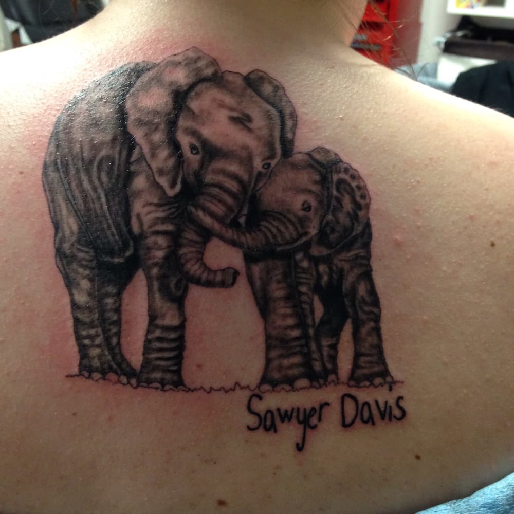 motherhood elephant family tattoo