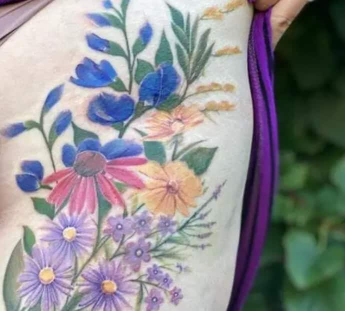 Beautiful flower tattoos for thighs