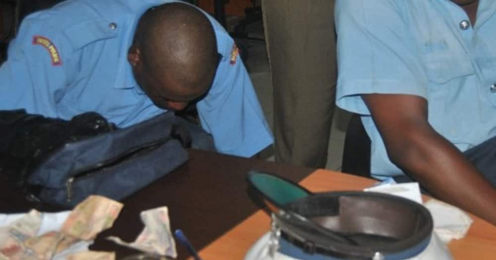 Police officers arrested over bribery. Photo: Kenya Police.