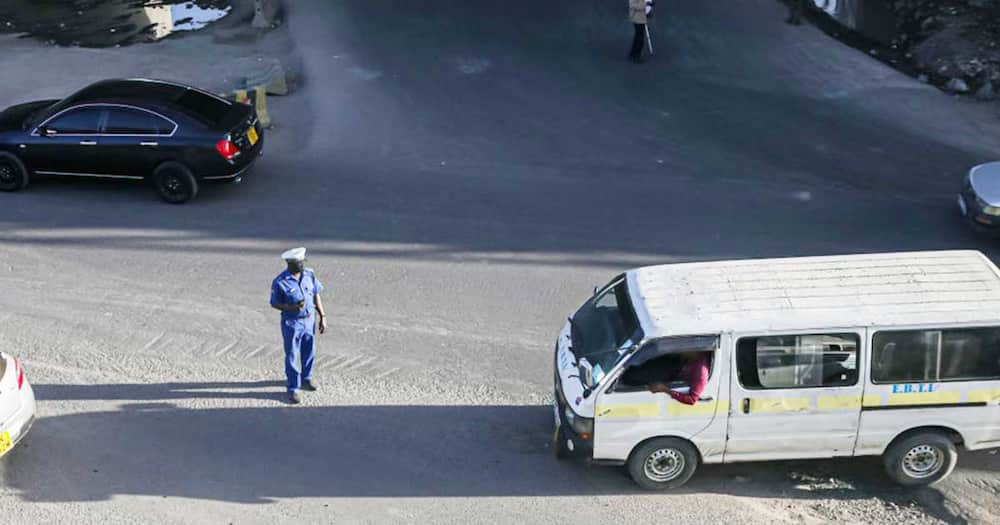 Kenyan traffic police officer.