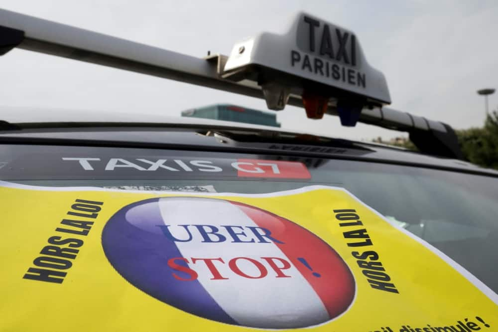 A report in France's Le Monde daily, citing documents, text messages and witnesses, alleges that Uber came to a secret "deal" with French President Emmanuel Macron when he was economy minister between 2014 and 2016.