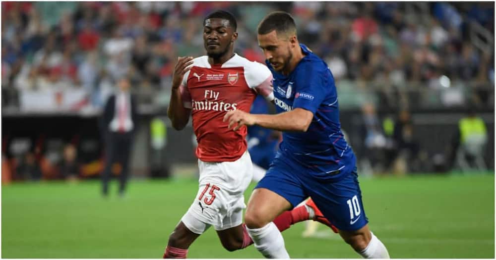 Maitland-Niles battles for the ball with ex-Chelsea ace Eden Hazard. Photo: Getty Images.