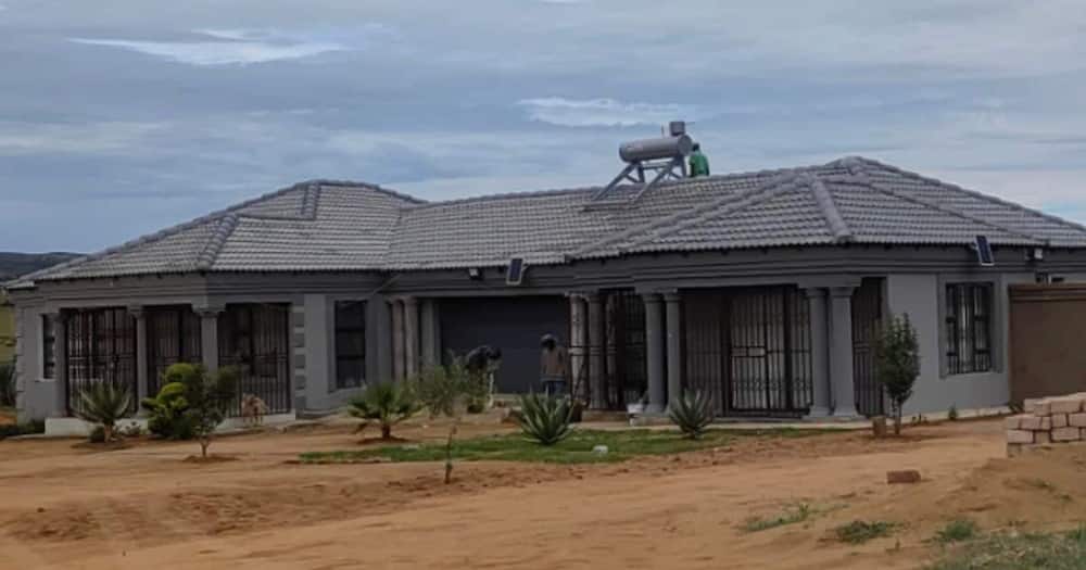 Man builds house for his mother