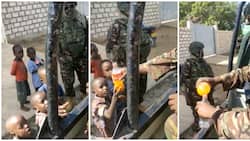 "Na Mimi Uncle": Video of KDF Soldier Sharing His Juice with Children Warms Hearts Online