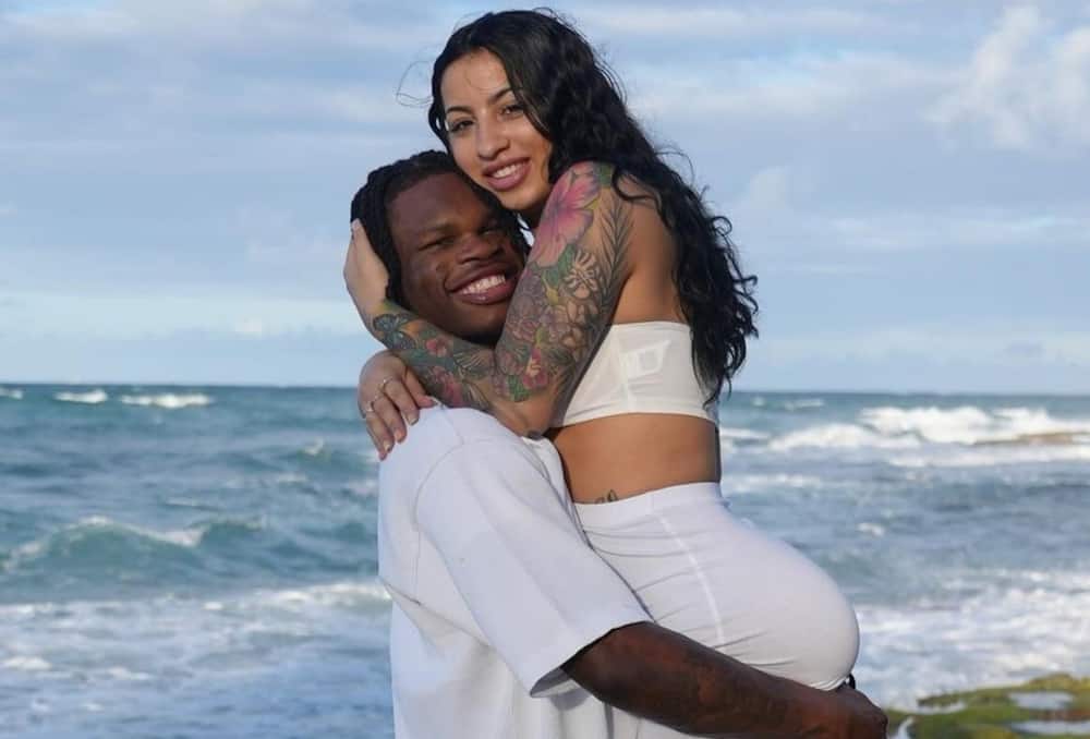 Travis Hunter and Leanna Lee dressed in white on the day they got engaged