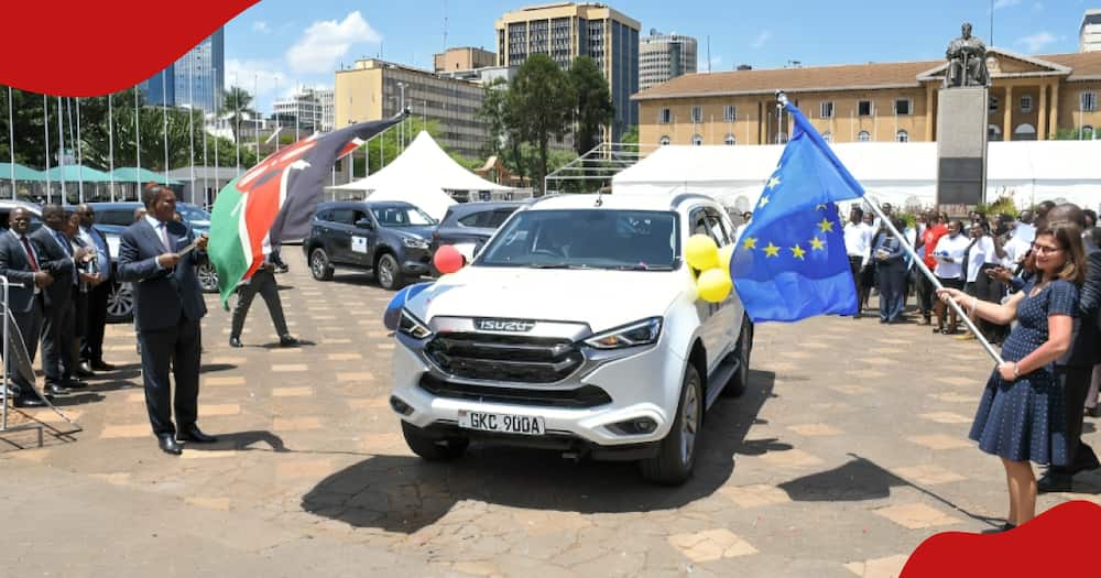 Attroney General Justin Muturi (left) and the European Union ambassador to Kenya, Henriette Geiger (right), flagging off one of the donated cars at KICC.
