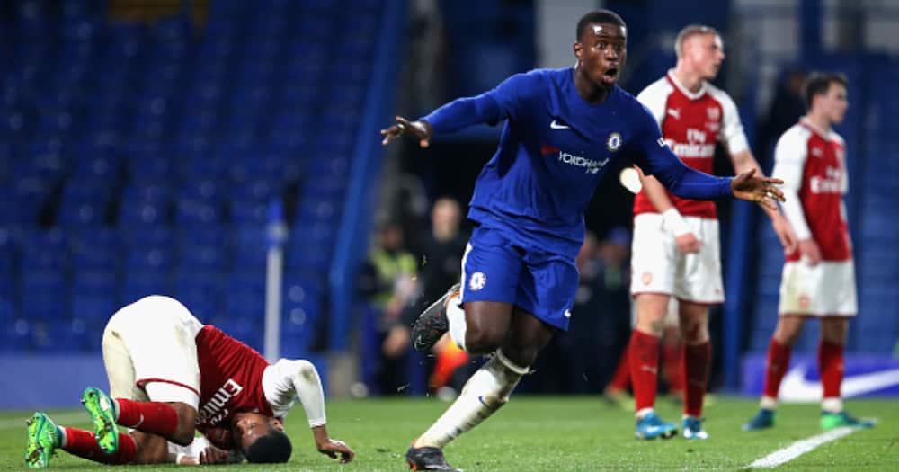 Marc Guehi celebrates after coring his sides second goal during the FA Youth Cup Final first leg match between Chelsea and Arsenal at Stamford Bridge on April 27, 2018. Photo by Alex Pantling/Getty Images.