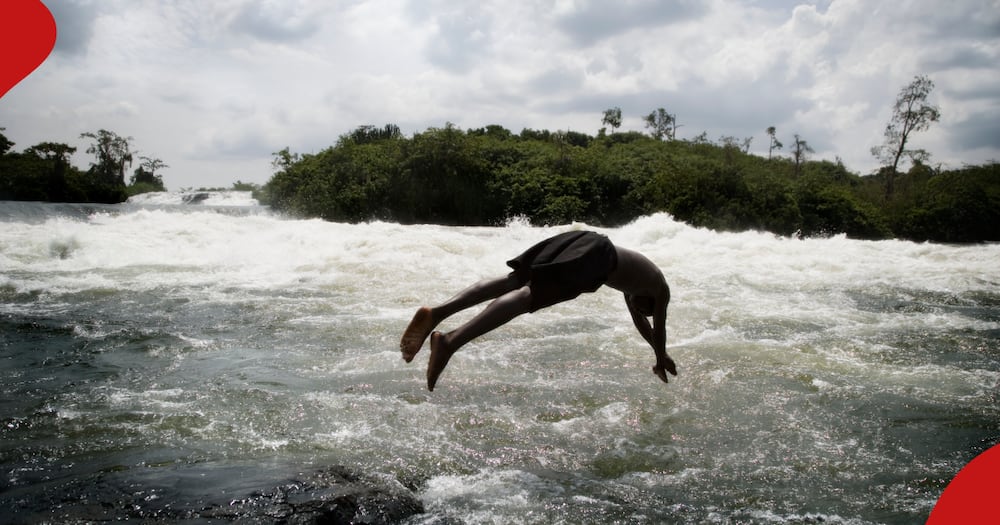 Illustrated photo of a man jumping into the river.