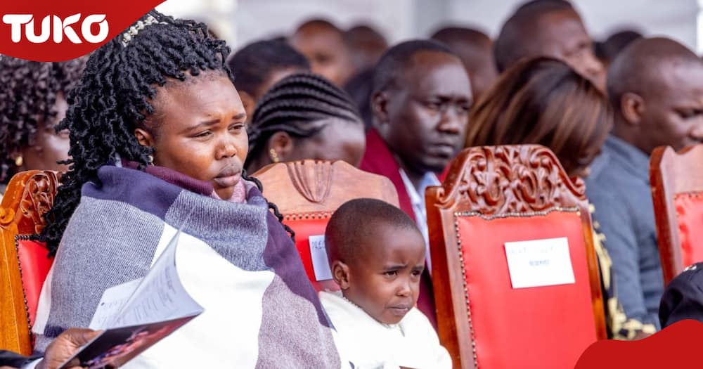 Kelvin Kiptum's widow Asaneth Rotich and daughter sorrowfully follow the burial service.
