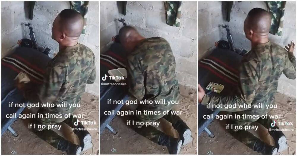 Nigerian soldier praying on his knees, soldier praying