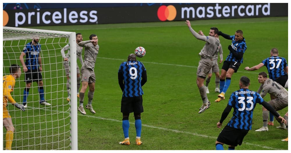 Romelu Lukaku inadvertently blocks Alexis Sanchez's goal-bound effort as Inter crash out of UCL