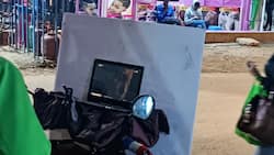 Kasarani Boda Boda Man Stuns Netizens after Getting Spotted Watching Movie with Sleek Laptop on Stage