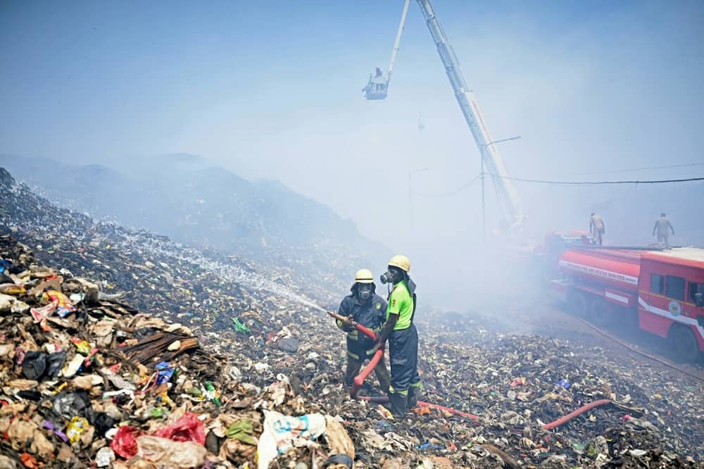 The world's landfills, like this one in Chennai, India, are a major source of planet-warming emissions