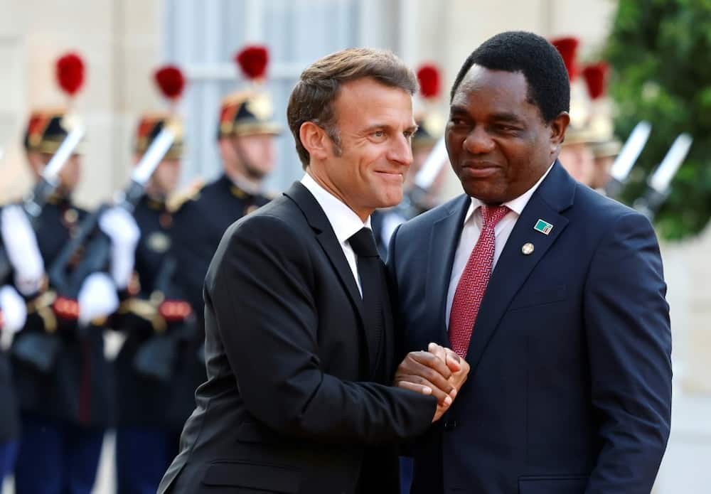 Smiles: Macron and Hichilema at the Elysee palace in Paris on Thursday