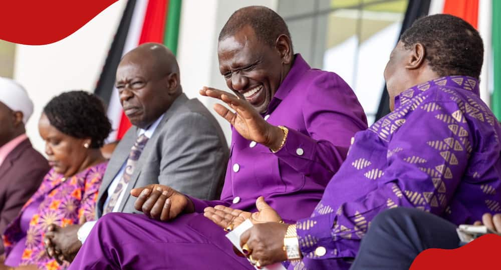 President William Ruto laughing