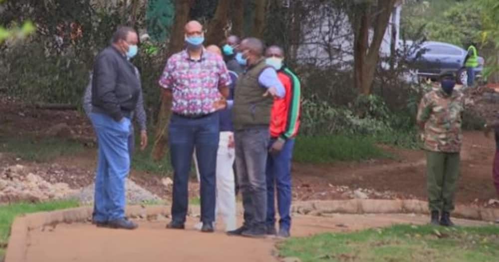 Uhuru Kenyatta takes stroll with journalist Alex Chamwada during visit to Michuki Park