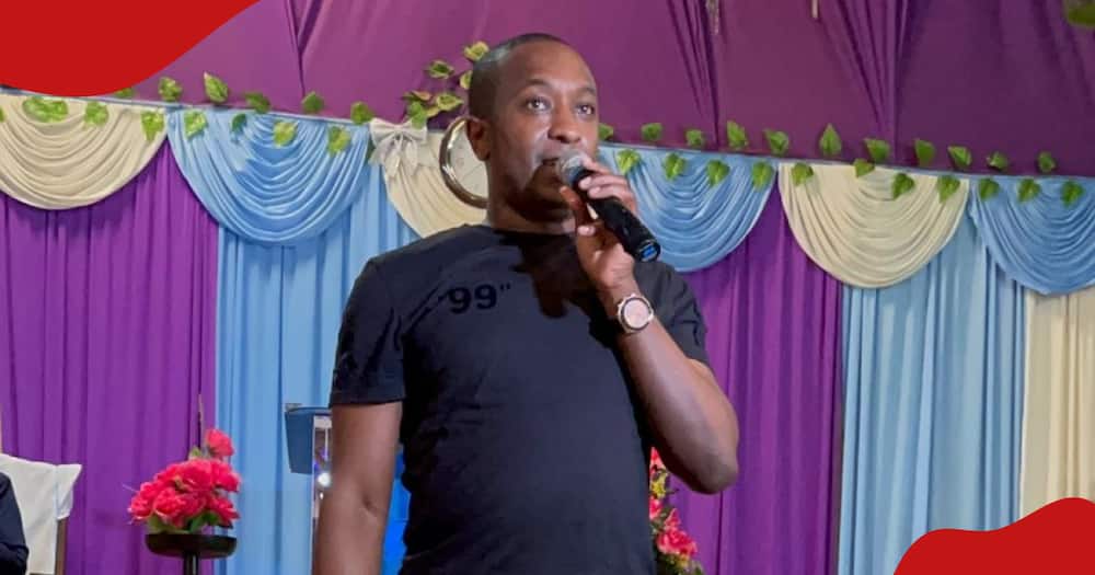 Steve Mbogo speaking at a church service in Nairobi.