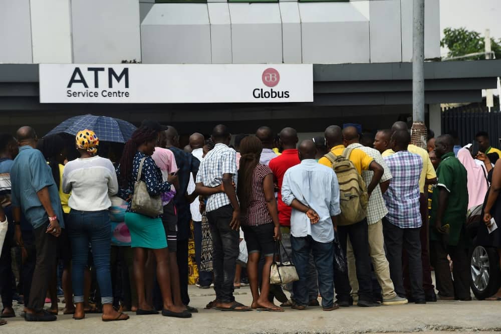 The naira currency exchange has caused cash shortages and queues outside ATMs and banks