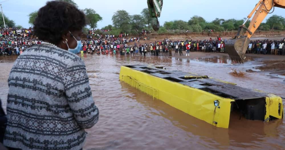 The wreckage of a bus that plunged into River Enziu. Photo: Charity Ngilu.
