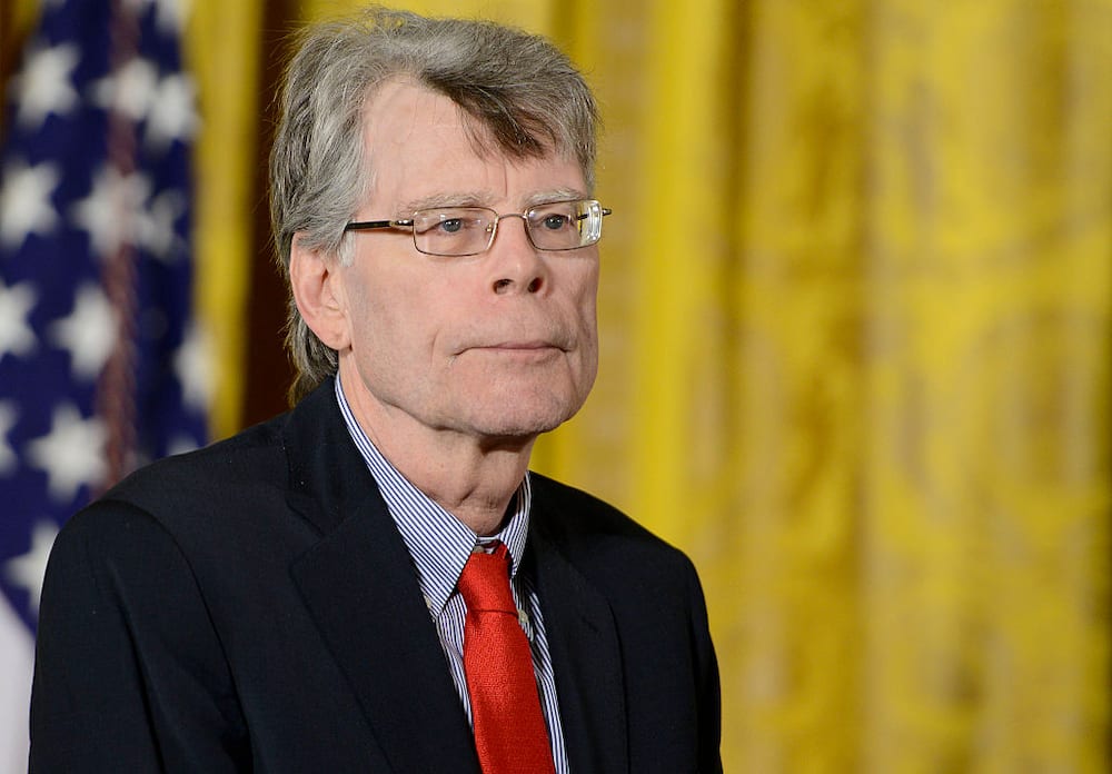 President Barack Obama presents author Stephen King with the 2014 National Medal of Arts at The White House on September 10, 2015 in Washington, DC.
