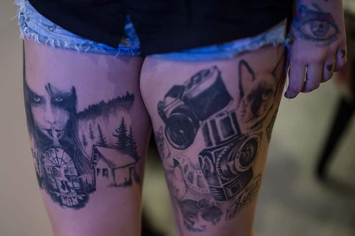 Feminine classy thigh tattoos