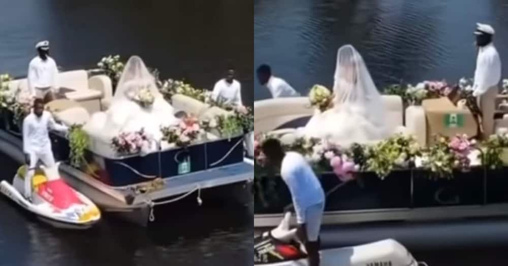 Bride arrives at her wedding venue on a boat.