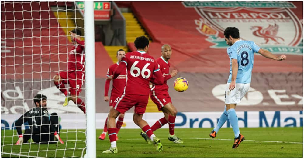 Man City demolish Liverpool at Anfield to open 5-point lead atop