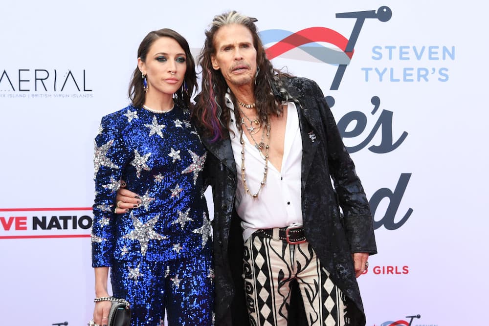 Singer Steven Tyler and his son Taj Tyler arrive for the premiere of