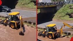 Video of Excavator Being Used to Draw Floodwater from Nairobi Highway Puzzles Kenyans