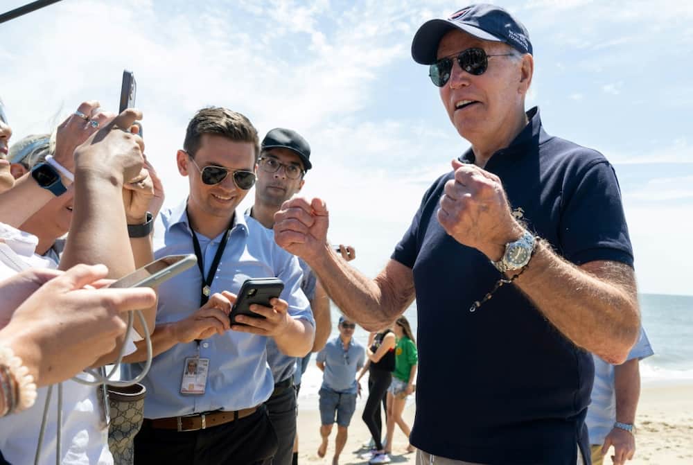 US President Joe Biden speaks with reporters in Rehoboth Beach, Delaware