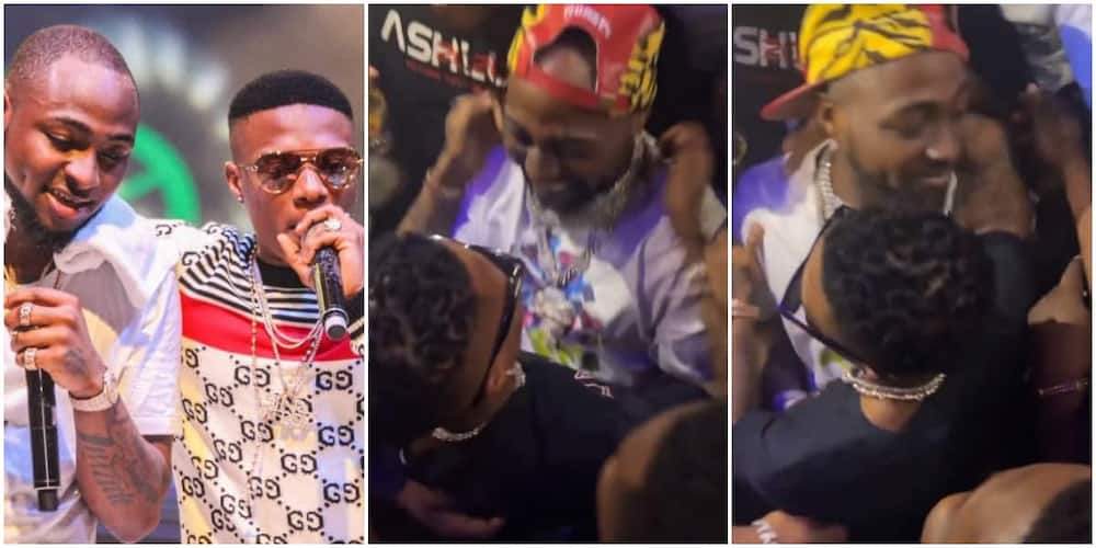 Love wins as Wizkid and Davido share passionate hug.