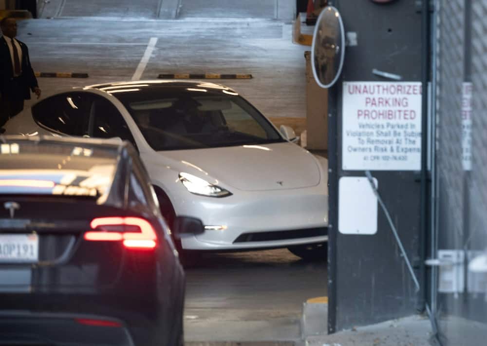 Elon Musk avoided press waiting for a glimpse of him heading into San Francisco federal court, where he defended himself against an accusation that his 2018 tweet about taking Tesla private at $420 a share amounted to fraud