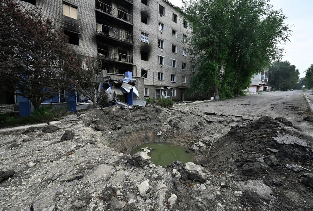 A shell crater in Siversk, 20 kilometres from the frontline in eastern Ukraine