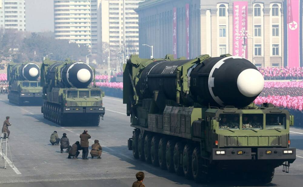 File KCNA photo of North Korean Hwasong-15 ballistic missiles during a military parade in Pyongyang