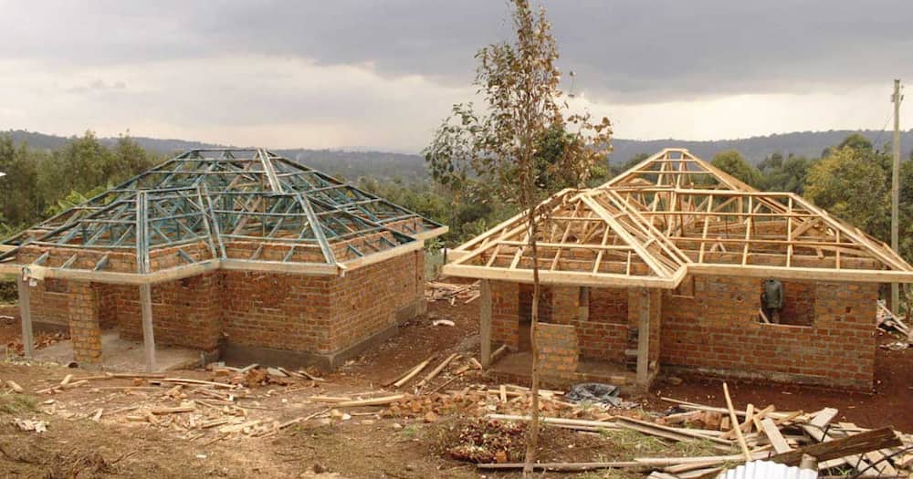 Fred Matiang'i building houses in Kisii.