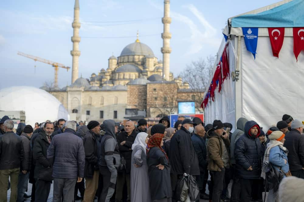 As food prices have soared, people line up for free meals in Istanbul during Ramadan