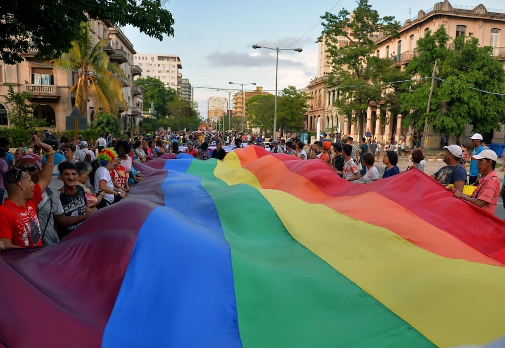 People participate in a gay pride parade in Havana in May 2018