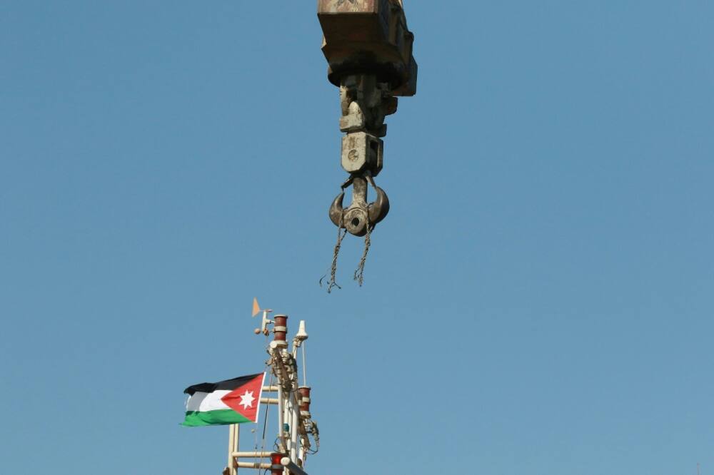 The remains of the snapped cable still hang from the crane after Monday's accident on the dockside in Aqaba