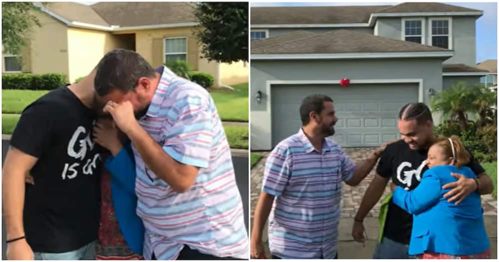 Father, mother and son get emotional at the unveiling of a brand new house.
