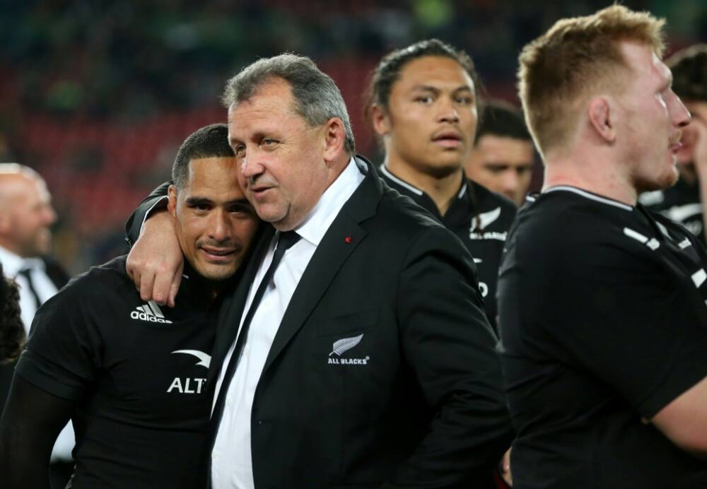 New Zealand coach Ian Foster embraces scrum-half Aaron Smith as they celebrate their victory