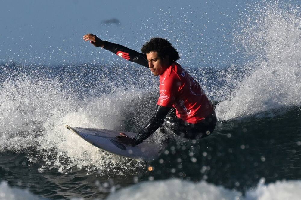 Costa Rica's Dariel Melendez, who has one leg, surfs on the second day of competition at the World Para Surfing Championship in Pismo Beach, California, on December 6, 2022