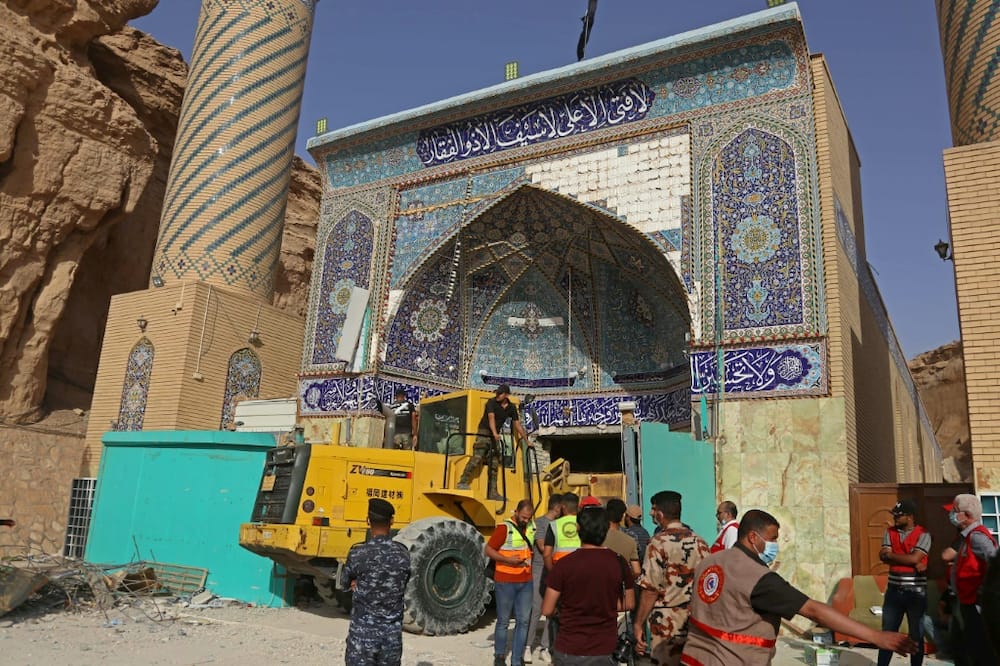 Between six and eight pilgrims had been reported trapped under the debris of the shrine, known as Qattarat al-Imam Ali, civil defence spokesman Nawas Sabah Shaker had said earlier