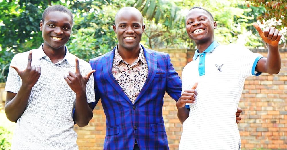 The two are students at the Trinity Senior Academy in Entebbe.