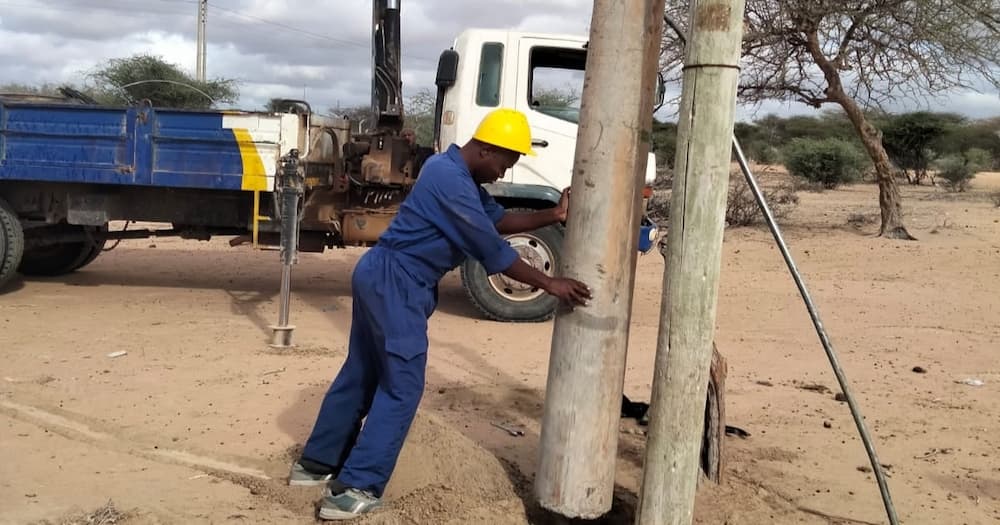 A Kenya Power staff at work.