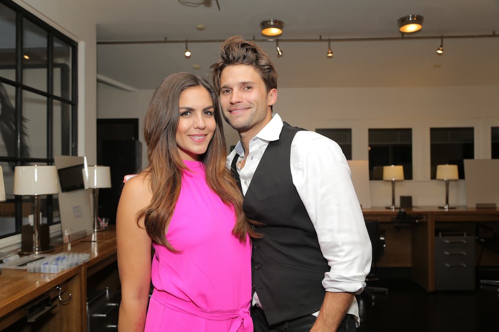 Katie Maloney (L) and Tom Schwartz (R) attend Katie's Pucker and Pout launch party at Frederic Fekkai Hair Salon