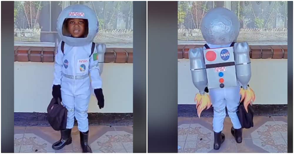 Three-year-old girl rocking her mother-made astronaut suit.